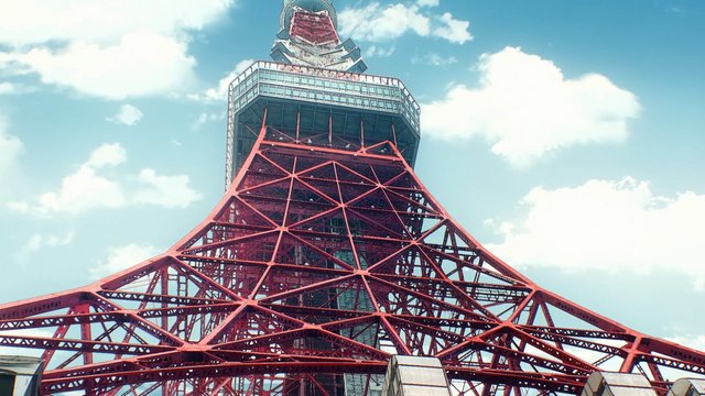 Red Steel Tower Under a Giant Spaceship